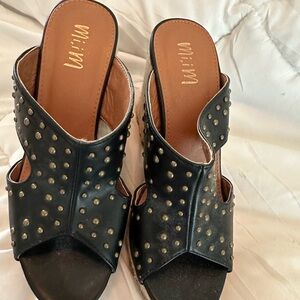 Black studded wedge heels